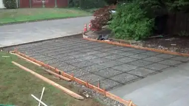Down Right Concrete crew finishing a new driveway in Bellevue, WA