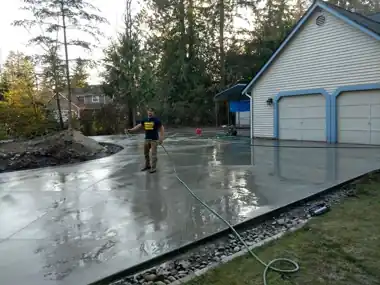 Circular Driveway Around Island by Down Right Concrete, Puget Sound area